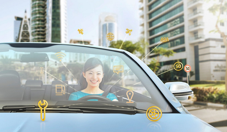 Woman inside a car with icons about cybersecurity