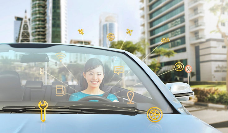 Woman inside a car with icons about cybersecurity