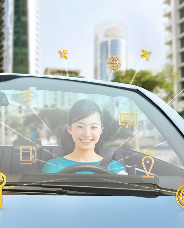 Woman inside a car with icons about cybersecurity