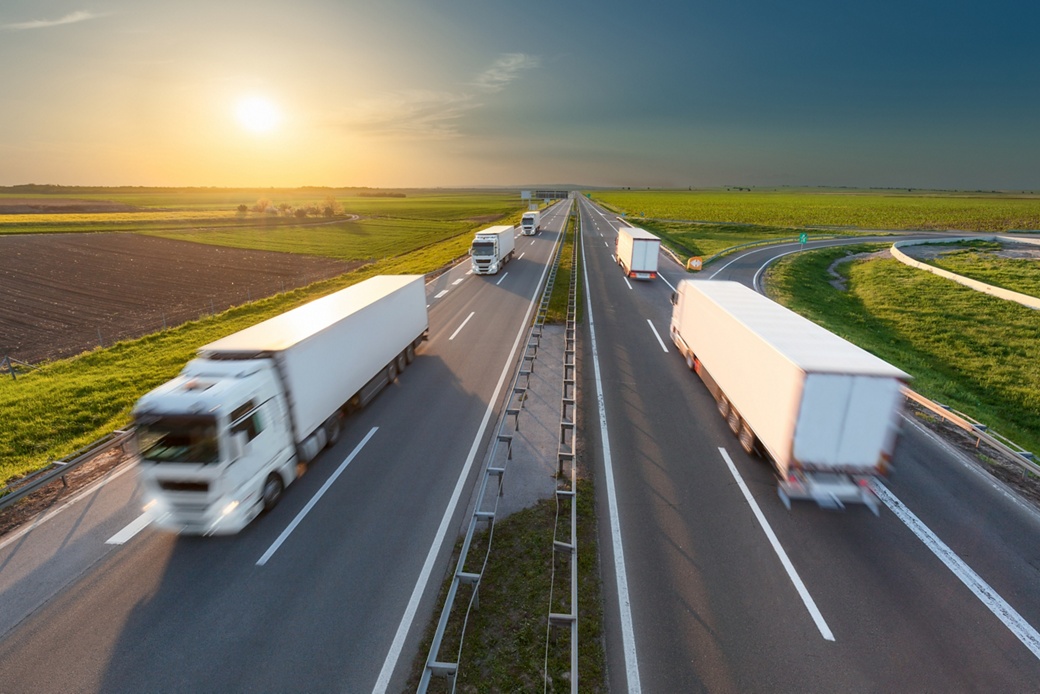 White trucks on a highway