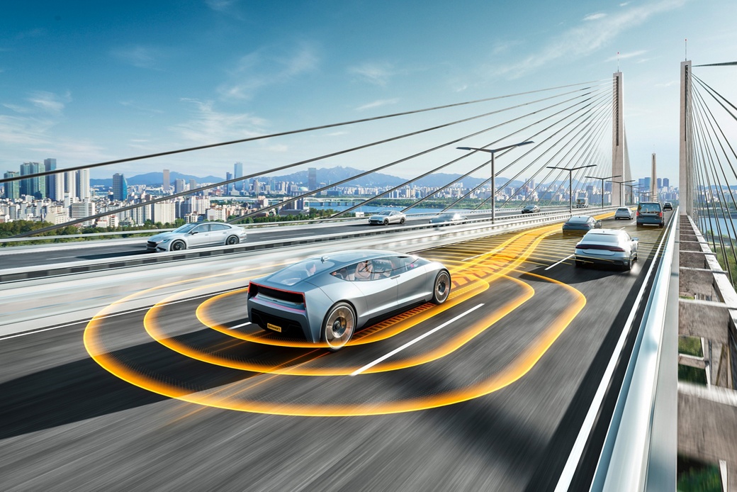 An autonomous driving car on a bridge with a modern city in the background.