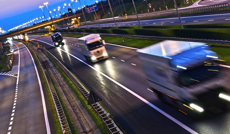 Trucks on four lane controlled-access highway in Poland.