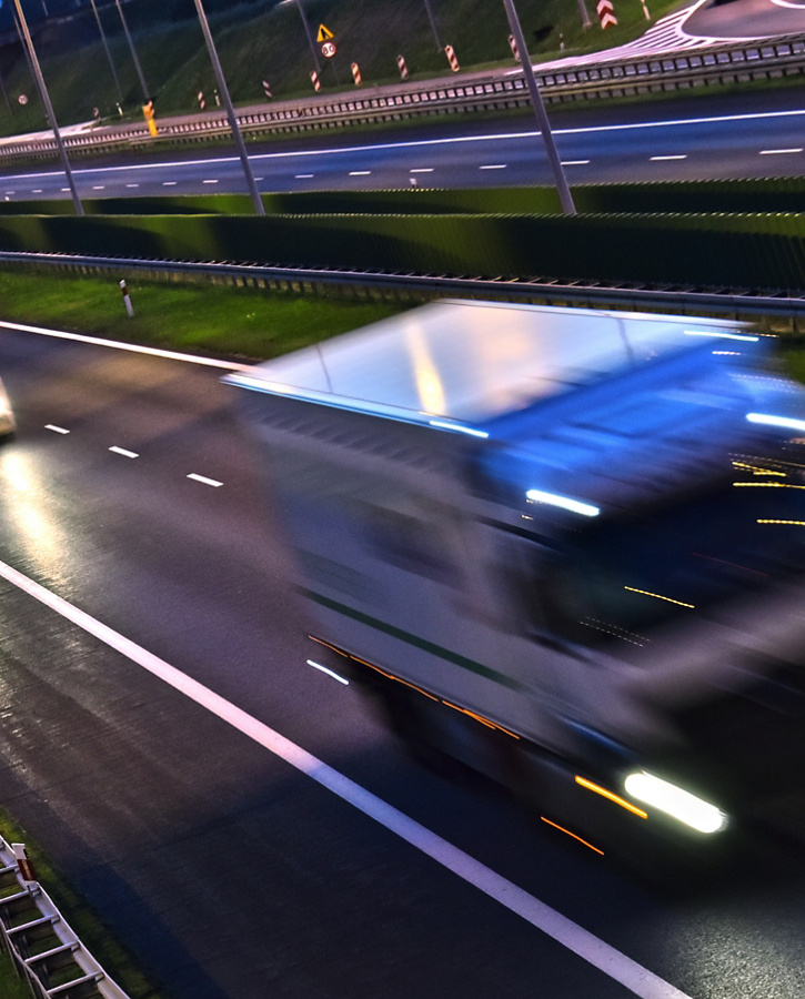 Trucks on four lane controlled-access highway in Poland.